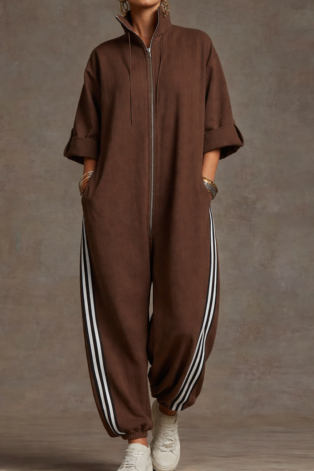 Mono deportivo a rayas con cremallera