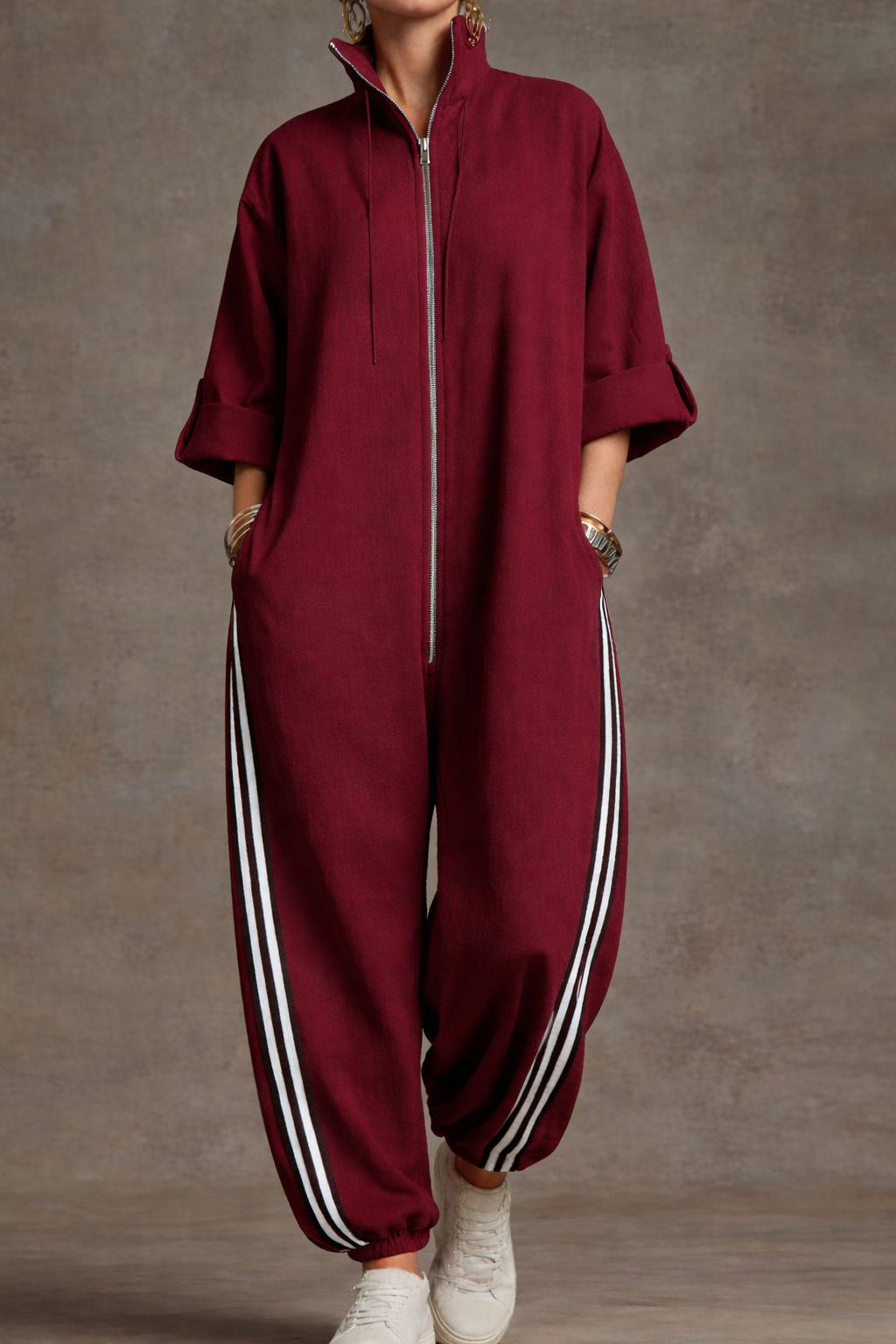 Mono deportivo a rayas con cremallera